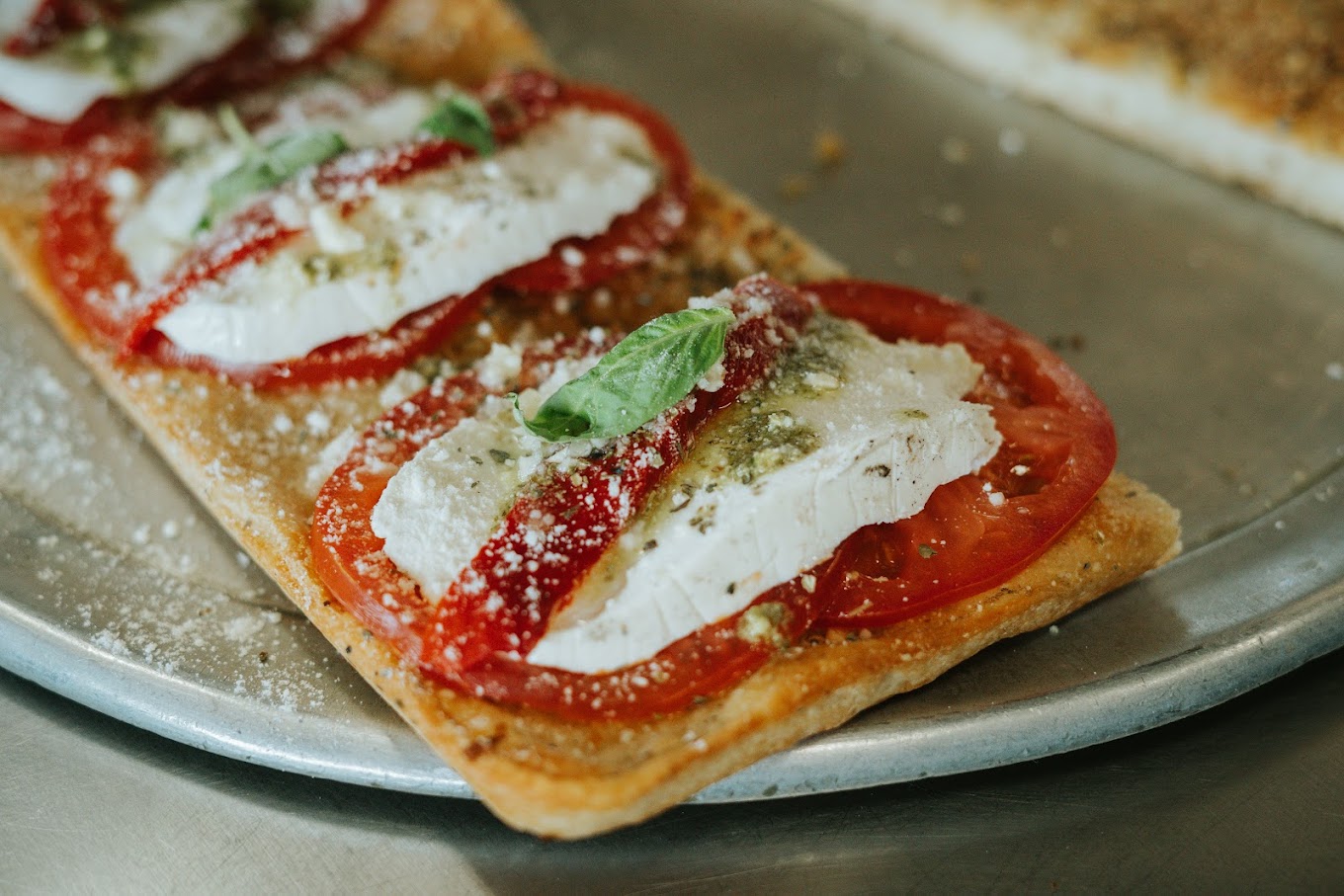 Carnival Restaurant & Pizzeria of Port Jefferson Station, NY Fresh Mozzarella Slice