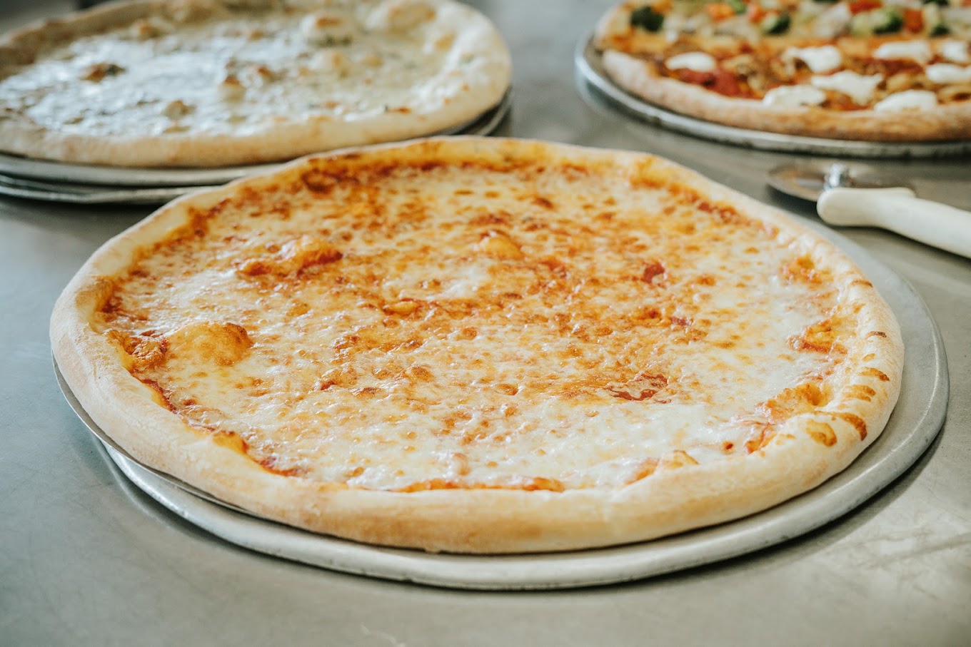 Carnival Restaurant & Pizzeria of Port Jefferson Station, NY White Slice